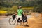 Bicycle tourist on the rural road