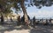 Bicycle tourists stopped to rest in shady spot on the promenade of the resort Gelendzhik