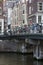 Bicycles attached to a bridge in Amsterdam