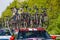 Bicycles on a car following cyclists during the second stage of Giro d\'Italia 2016