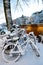 Bicycles covered in snow