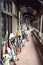 Bicycles leaning on the wall of a covered balcony