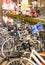 Bicycles lining a bridge over the canals of Amsterdam, Netherlan