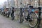 Bicycles lining a bridge over the canals of Amsterdam, Netherlands