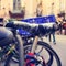 Bicycles locked in a street of a city, with a filter effect