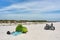 Bicycles parked by the green beach tent at a sea beach in Dueodde, Bornholm island, Denmark