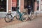 Bicycles parked and locked on a shopping street in Dutch town