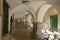 Bicycles parked under medieval covered walkway, Chiavari , Italy