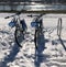 Bicycles on the snow with a river view