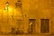 Bicycles under a Streetlamp in Grado at Night