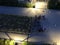 Bicycles in the yard at night