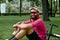 Bicyclist taking rest in the green grasses. Summer time, great mood.