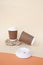 Bidegradable paper brown coffee cups with biodegradable white lids.