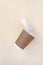 Bidegradable paper brown coffee cups with biodegradable white lids.