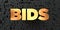 Bids - Gold text on black background - 3D rendered royalty free stock picture