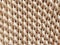 Biege knitted pattern textured background