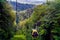 Bielsko Biala, South Poland: Moving cable car trolley through forest and hills carrying passengers