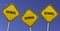 biennial - three yellow signs with blue sky background