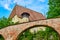 Biertan fortified church - exterior view of the brick arched wall, part of the church tower and roof. Tourism concept.
