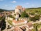 Biertan town and Biertan lutheran evangelical fortified church in Sibiu County, Transylvania, Romania. Aerial view.