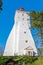 Big ancient tall white lighthouse in Kopu