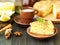 Big Apple pie, charlotte and piece, coffee in cup on dark brown-blue wooden table, side view, selective focus