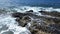 Big atlantic ocean waves meet the rocky coasts of the Canary Island of Tenerife