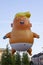 A big balloon mocking Donald Trump depicting the USA President as a baby and used in connection with demonstrations and protests a