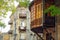 Big beautiful rounded wooden Georgian style balcony on the street of Tbilisi, Georgia