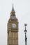 Big Ben / Elizabeth Tower in Westminster, London with CCTV camera next to it.