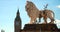 Big Ben, Houses of Parliament and the Lion Statue on Westminster Bridge, London, England