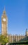 Big Ben tower in London, against a cloudless blue sky