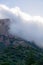 Big Bend National Park cliff face in fog from hiking trail