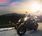 Big bike ,motorcycle parking on top of mountain with sun light o