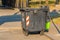 Big black recycling container on the street