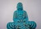 A big blue buddha meditating