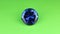 Big blue rhinestone, diamond, crystal sparkles on green screen. Zoom.