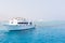 Big boat yachting in blue quiet tropical sea, summer landscape of ship in calm open ocean with copy space