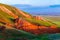 Big Bogdo mountain. Red sandstone outcrops on the slopes sacred mountain in Caspian steppe Bogdo - Baskunchak nature reserve,