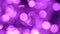 Big bokeh background. Purple or violet defocused circular facula.