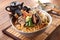 Big bowl of instant noodle with abalone, shrimp, clams, onion an