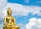 Big buddha at golden triangle on blue sky background