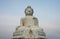 Big Buddha sculpture. Beautiful religious sculpture from white marble.