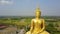 Big Buddha of Thailand, Aerial scene from sky Drone fly slide right