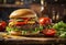 Big burger with tomatoes, lettuce, cheese and pickles on a wooden table. Junk food concept