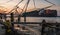 big cargo boat and old Chinese fishing nets during the Golden Hours at Fort Kochi, Kerala, India