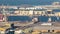 Big cargo ship at industrial port timelapse aerial fiew from above at evening in Abu Dhabi