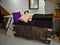 Big cargo wooden crate upcycled into a sofa to match the industrial interior design in an