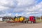 Big caterpillar on a special low-loader trailer truck,
