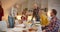 Big Caucasian family sits down a Christmas table evening dinner union joy smile conversation home comfort